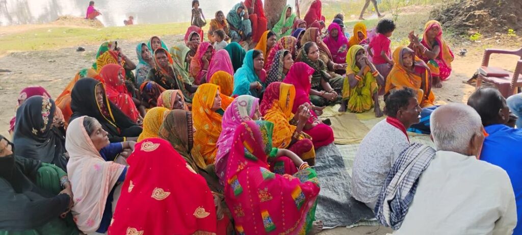 Women artisans at a village meeting